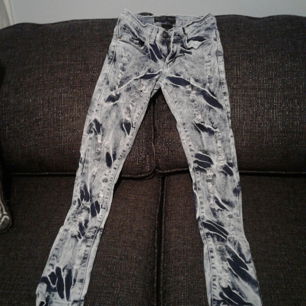 These are ripped blue jeans